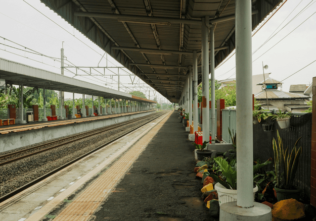 Row of steel columns supporting a railway platform shed roof